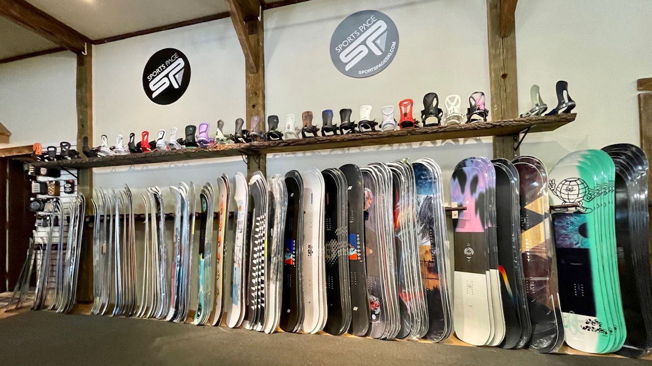 Large selection of snowboards in stock at Sports Page